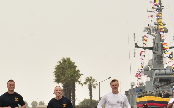 Sailors of Patrol Squadron (VP) 9 compete in a 10K