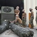US Navy Seabees assigned to Naval Mobile Construction Battalion 5 set up an environmental control unit
