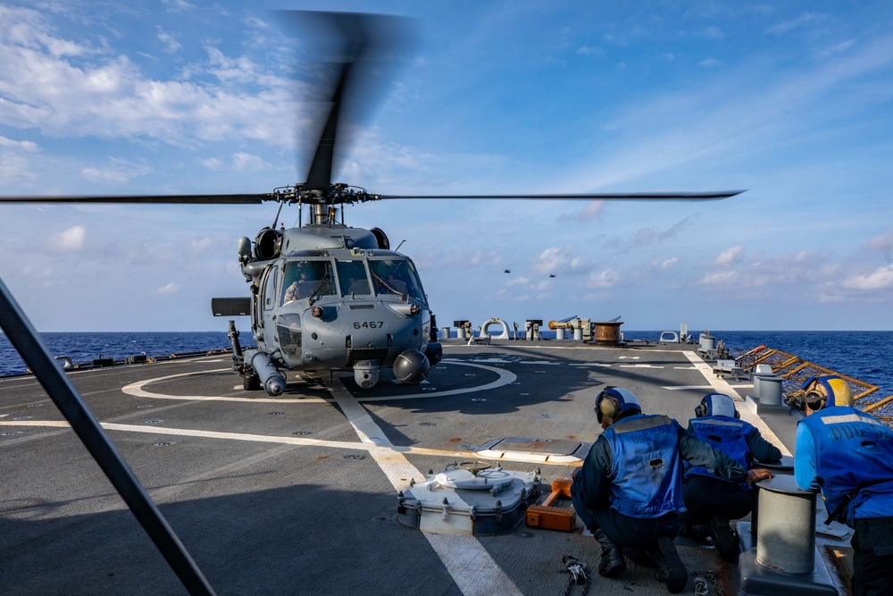 A U.S. Air Force HH-60G Pave Hawk Conducts Deck Landing Qualifications on the Flight Deck aboard USS Barry