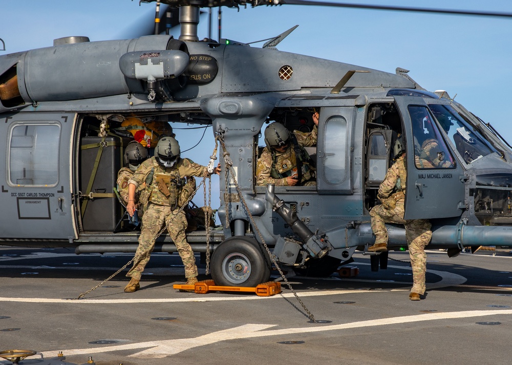 A U.S. Air Force HH-60G Pave Hawk Conducts Deck Landing Qualifications on the Flight Deck aboard USS Barry