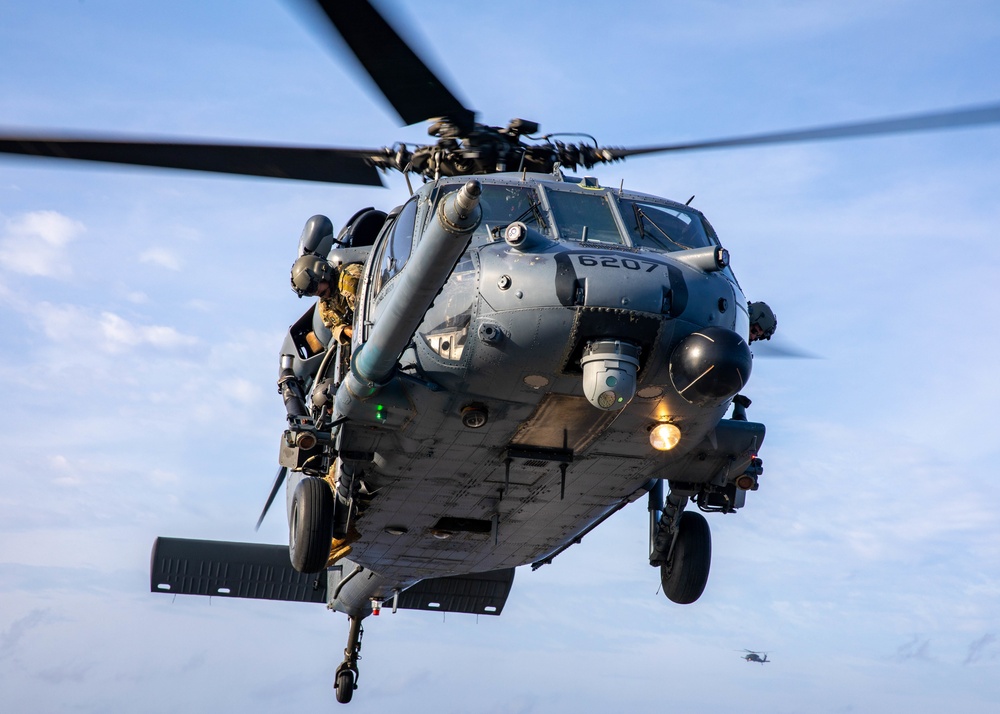 A U.S. Air Force HH-60G Pave Hawk Conducts Deck Landing Qualifications on the Flight Deck aboard USS Barry