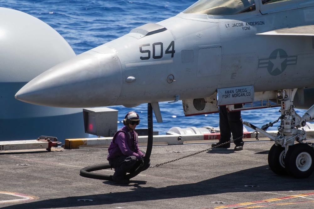 USS Carl Vinson (CVN 70) Sailors Conduct Flight Deck Operations