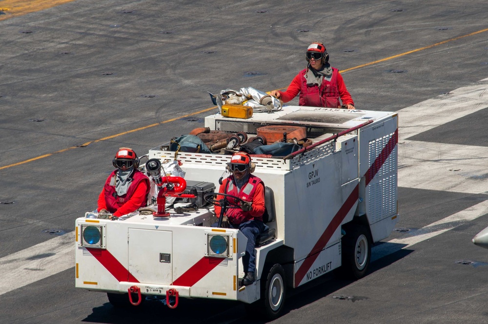 USS Carl Vinson (CVN 70) Sailors Conduct Flight Deck Operations