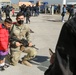 Afghan Travelers prepare to board a flight bound for the United States