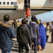 Afghan Travelers prepare to board a flight bound for the United States