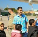 Afghan Travelers prepare to board a flight bound for the United States