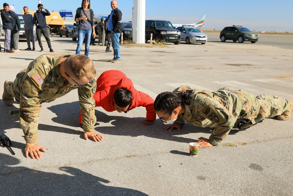 Afghan Travelers prepare to board a flight bound for the United States