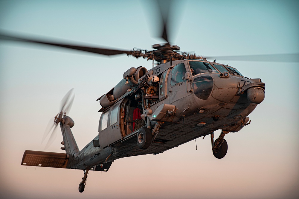 HSC-26 conducts deck landing qualifications aboard USS Portland