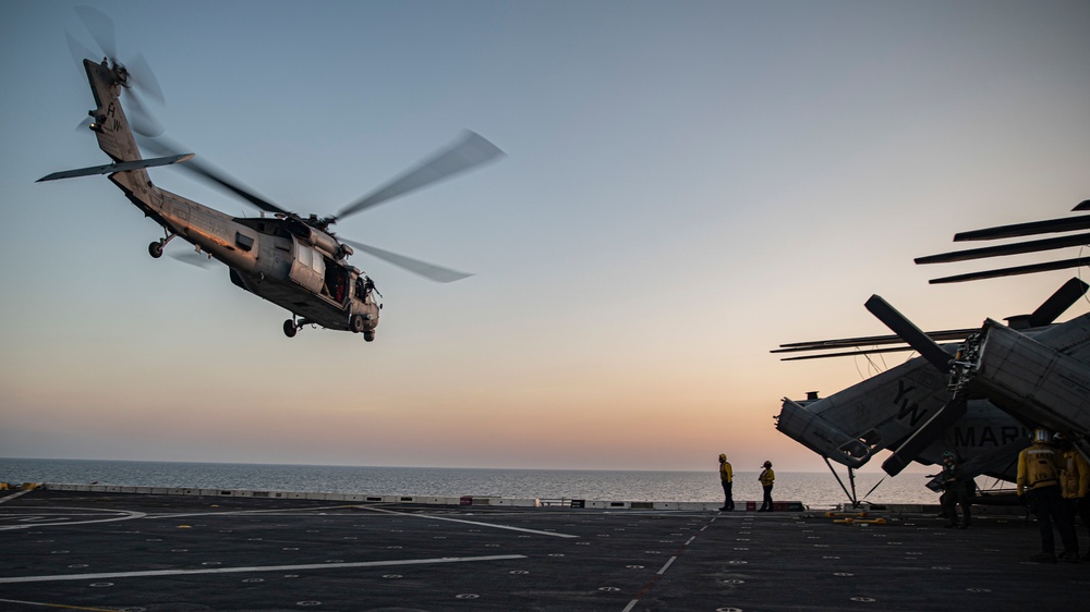 HSC-26 conducts deck landing qualifications aboard USS Portland