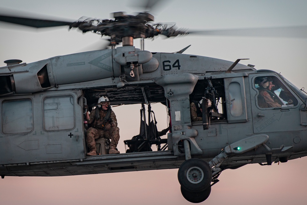 HSC-26 conducts deck landing qualifications aboard USS Portland