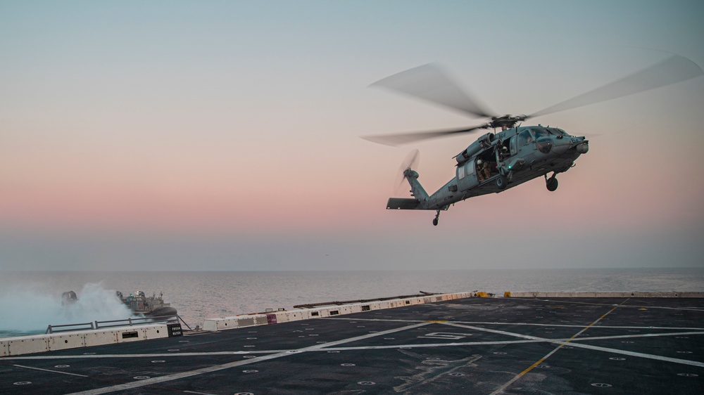 HSC-26 conducts deck landing qualifications aboard USS Portland