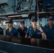 Sailors aboard the USS Barry Stand Watch in the Pilot House during a Replenishment-at-sea with USNS Tippecanoe
