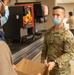 Soldiers serve up food to Afghan evacuee families at Fort McCoy dining facilities