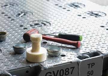 The Young Punch; Airman invents munitions tool