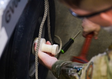 The Young Punch; Airman invents munitions tool