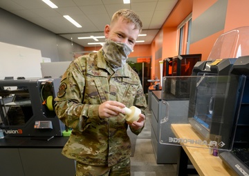 The Young Punch; Airman invents munitions tool