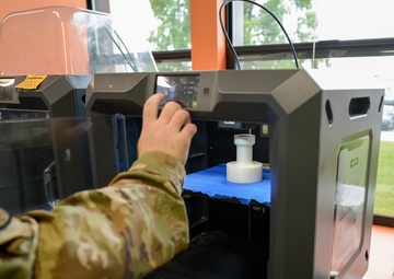 The Young Punch; Airman invents munitions tool
