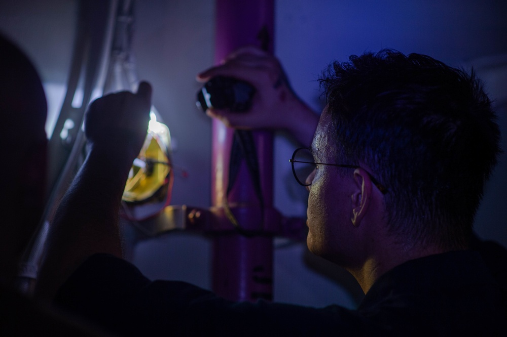 USS Carl Vinson (CVN 70) Sailor Performs Interior Maintenance