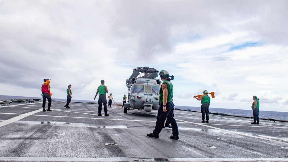 USS Charleston Sailors Move MH-60S Seahawk