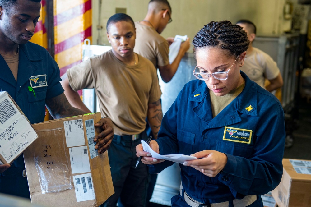 USS Carl Vinson (CVN 70) Sailors Sort Mail