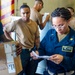 USS Carl Vinson (CVN 70) Sailors Sort Mail