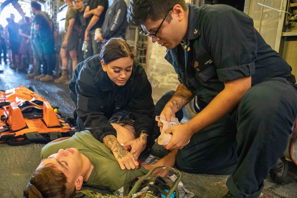 USS Arlington Sailors Train on Noncombatant Evacuation Operations