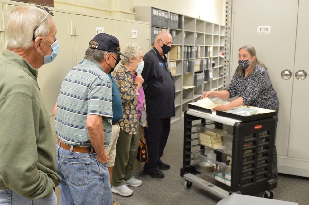 Museum volunteers visit artifact storage facility