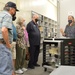 Museum volunteers visit artifact storage facility