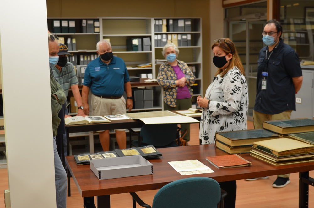 Museum volunteers visit special collections facility