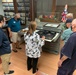 Museum volunteers visit special collections facility