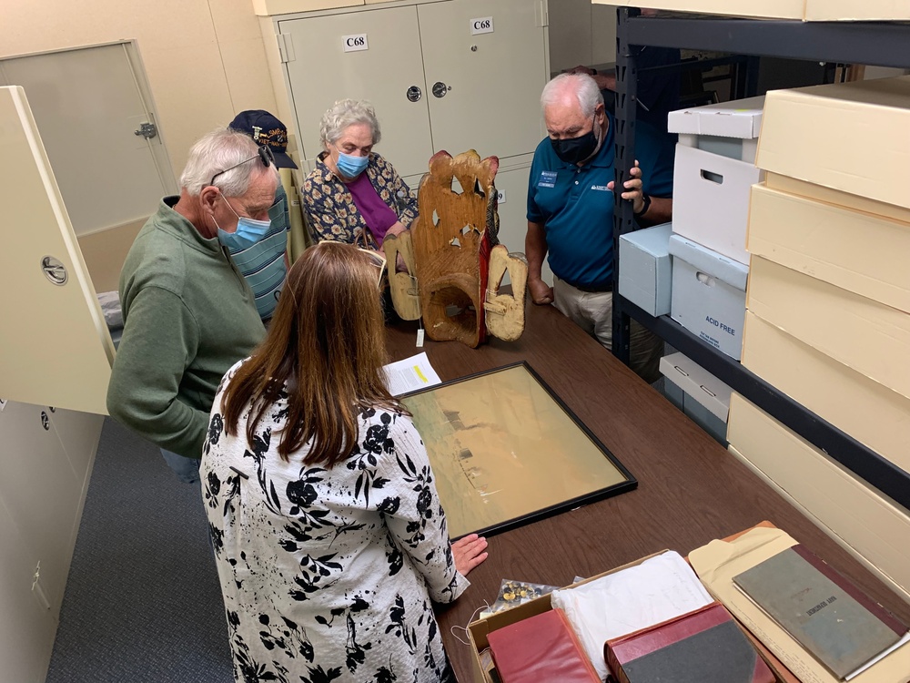Museum volunteers visit special collections facility