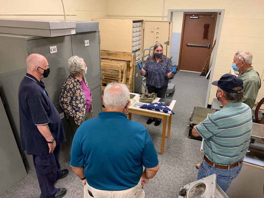 Museum volunteers visit artifact storage facility