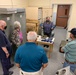 Museum volunteers visit artifact storage facility