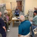 Museum volunteers visit artifact storage facility