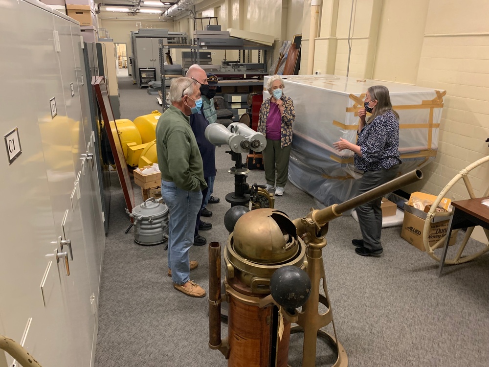 Museum volunteers visit artifact storage facility