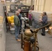 Museum volunteers visit artifact storage facility