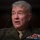 SECDEF, CJCS, CENTCOM Senate Armed Services Testimony A senior military officer in olive green dress uniform is speaking, likely at a formal hearing or official proceeding. The individual displays an extensive array of colorful service ribbons and medals on their left chest, indicating significant military experience and decorations. A microphone is partially visible in the background, suggesting a formal testimony or briefing setting.