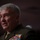 SECDEF, CJCS, CENTCOM Senate Armed Services Testimony A senior U.S. Marine Corps officer in dress uniform is speaking, likely at a formal hearing or briefing. The individual wears a heavily decorated uniform with numerous service ribbons and rank insignia visible on the shoulders. The background is dark and blurred, suggesting an indoor formal setting.
