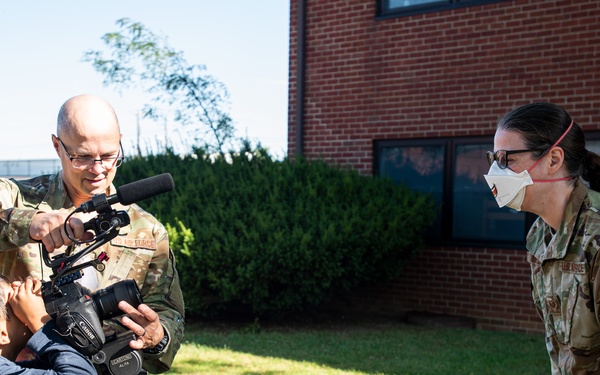 Afghan children watch Public Affairs interview