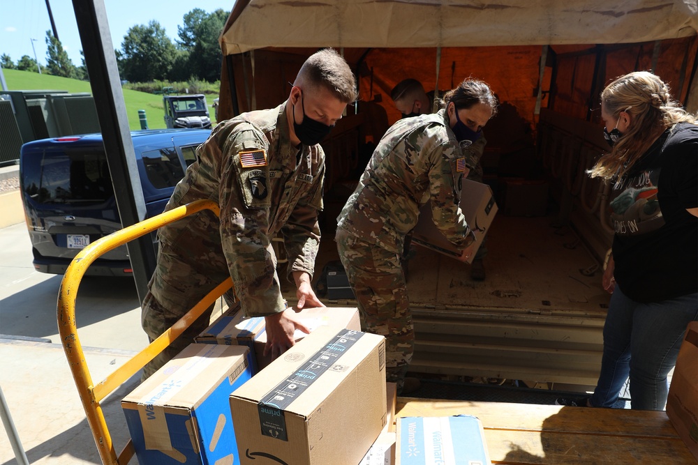 John Deere Employees Donate School Supplies for NC Guard Families