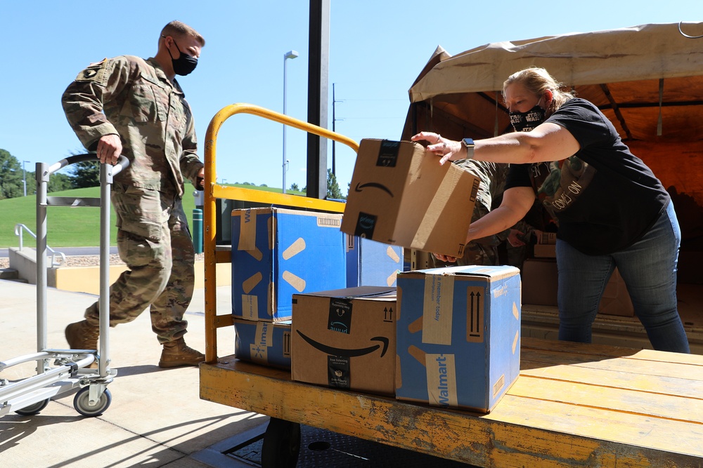 John Deere Employees Donate School Supplies for NC Guard Families