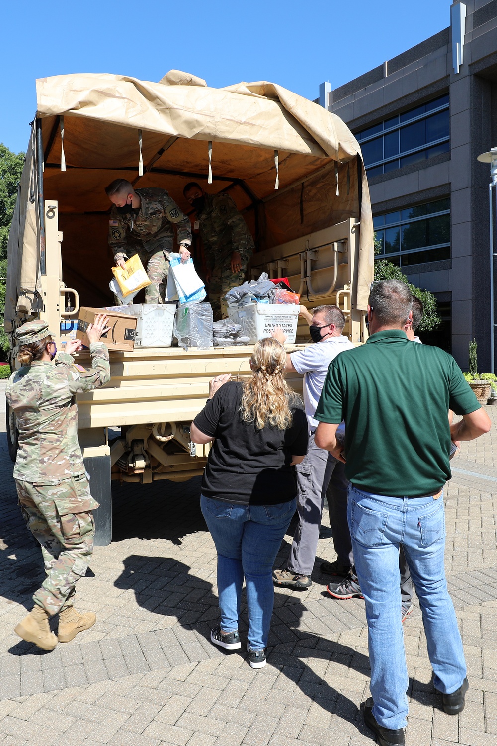 John Deere Employees Donate School Supplies for NC Guard Families