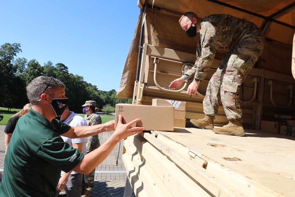 John Deere Employees Donate School Supplies for NC Guard Families