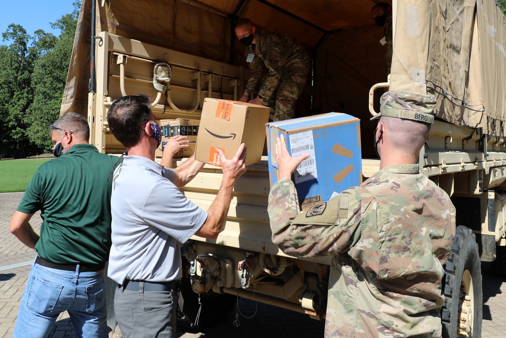 John Deere Employees Donate School Supplies for NC Guard Families