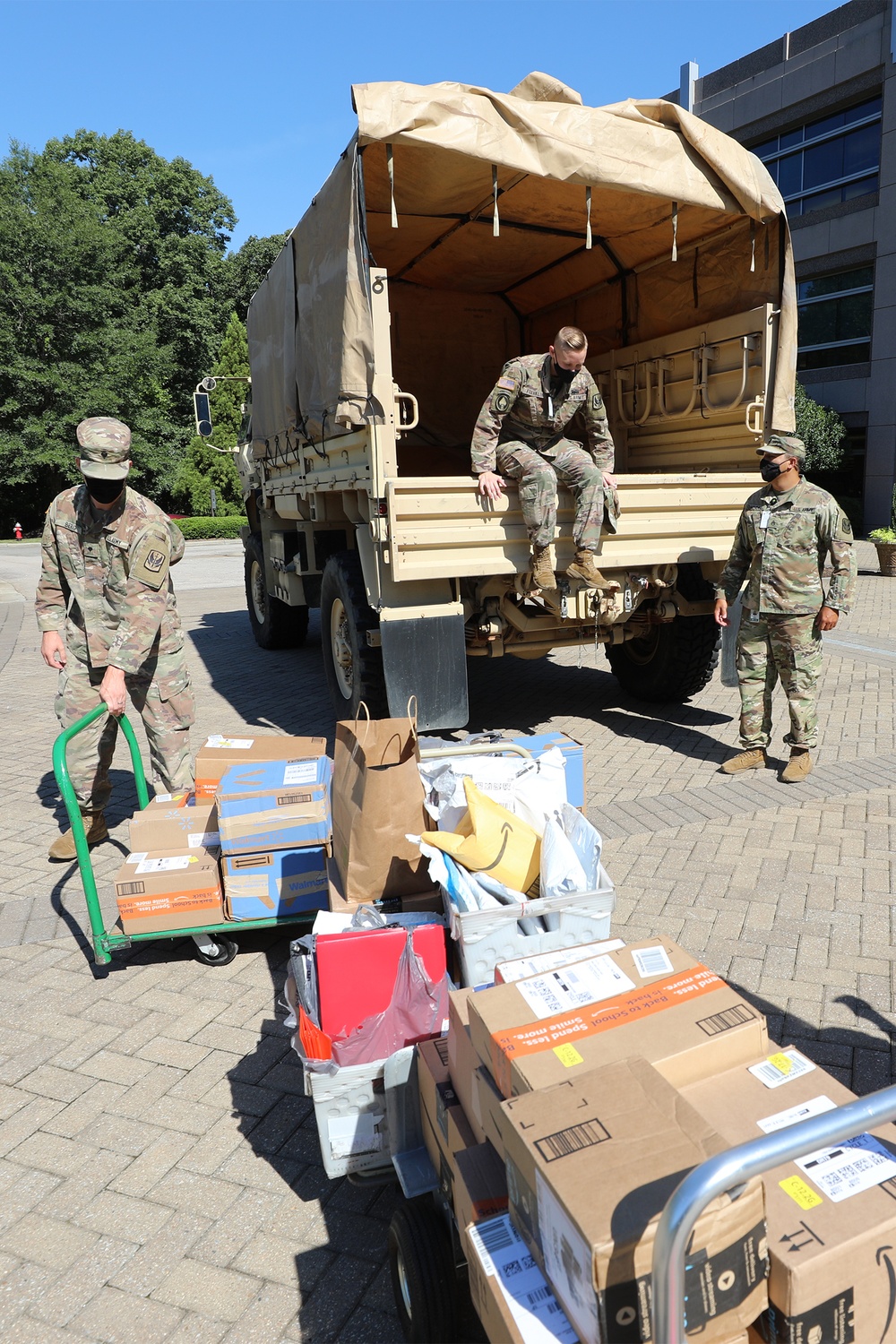 John Deere Employees Donate School Supplies for NC Guard Families