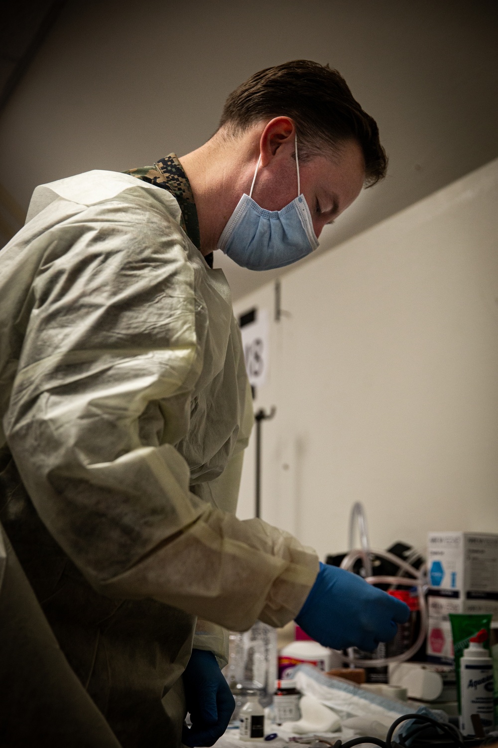 U.S. Navy Corpsmen provide medical assistance on Task Force Quantico