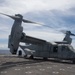Sailors aboard USS Pearl Harbor guide MV-22B Ospreys from 11th MEU