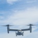 Sailors aboard USS Pearl Harbor guide MV-22B Ospreys from 11th MEU
