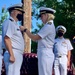 Captain Jason Schneider receives award from Commander Melissa Chope