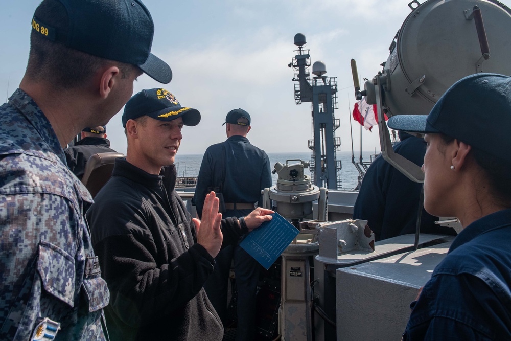 USS Mustin (DDG 89) replenishes at sea